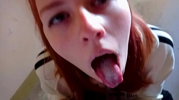 Cum in the mouth of a red-haired Russian girl